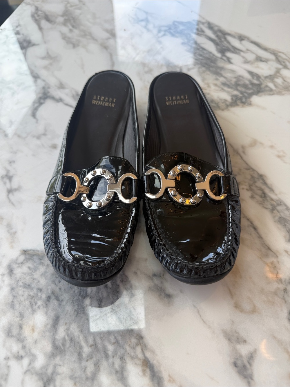 Stuart Weitzman Black Patent Leather Slip-On Mules with Gold Chain Detail